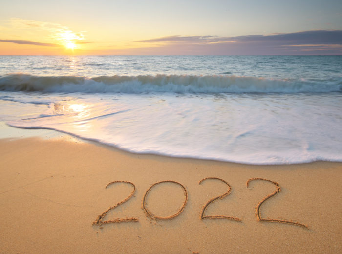2022 year on the sea shore during sunset. Element of design.