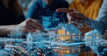 Real estate agent presenting a house model to a couple with a digital screen showing property details