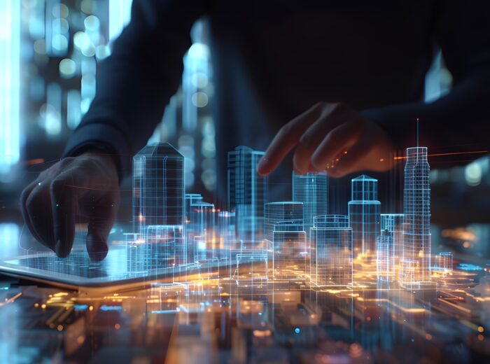 a man using digital tablet, and modern buildings hologram. Real estate business and building technology concept